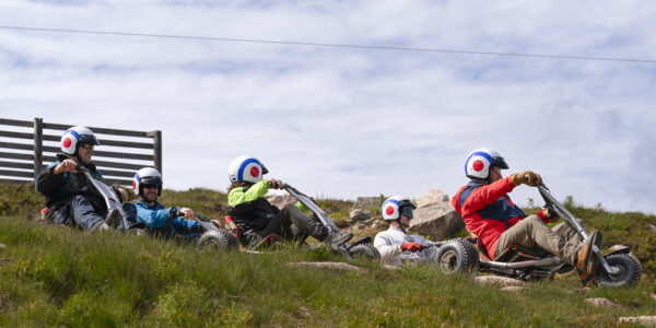 People on mountain carts